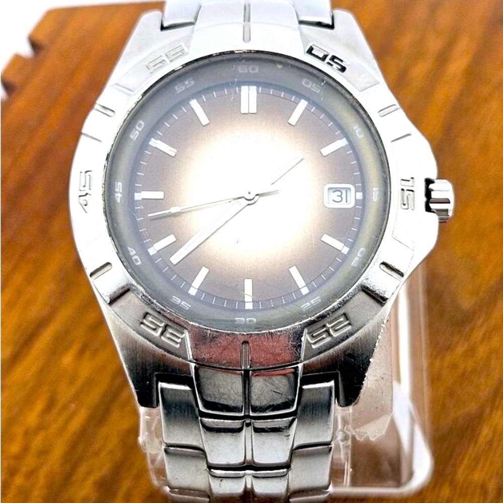 FOSSIL BLUE:Mens Silver moon face Watch

Straight Class:Pics dont do it justice